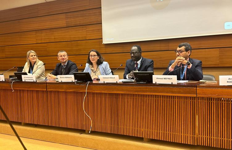 Panelists speak at the side event